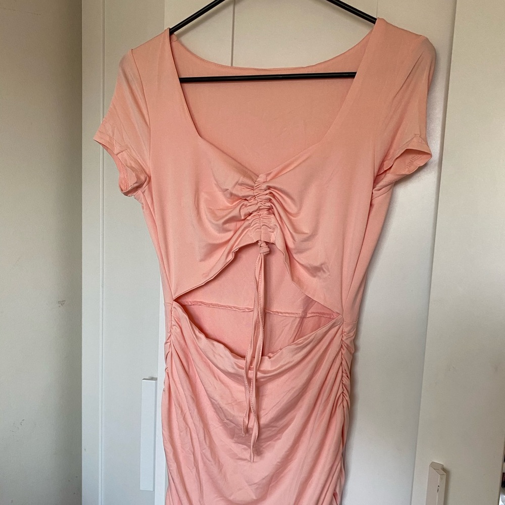 Bodycon dress with drawstrings and front cut out